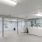 a large room with white cabinets