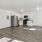 a kitchen with a wood floor