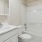 a bathroom with a toilet sink and bathtub