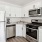 a kitchen with white cabinets